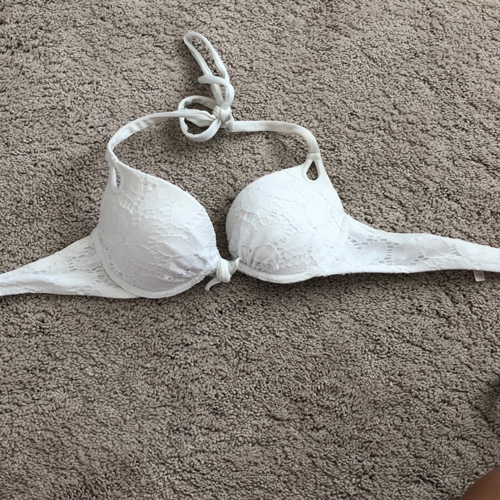 A white lace swim suit top